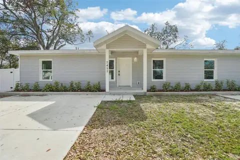 7409 & 7411 E 23RD AVE — home for sale