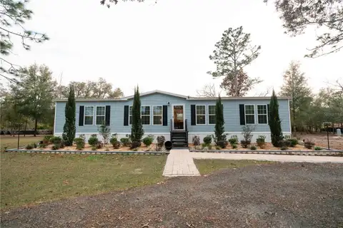 7670 NE 97TH CT — home for sale